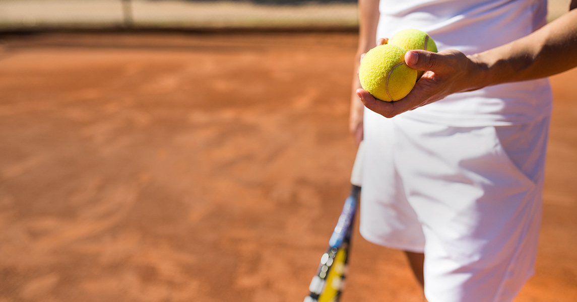 Tennis player preparing for a coaching session